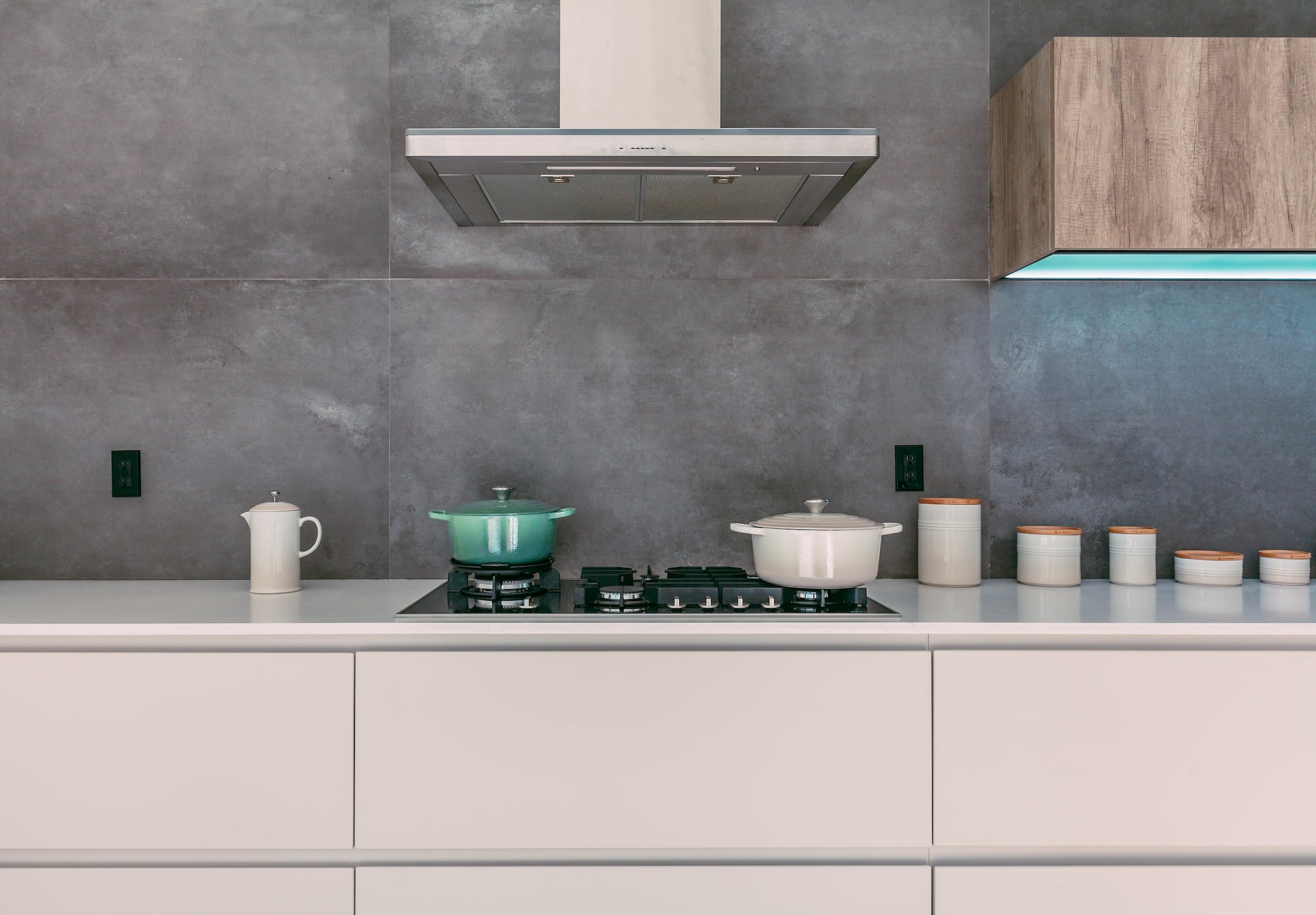 Grey distressed tiles on kitchen wall